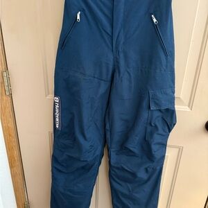 Husqvarna Men's Blue Cargo Leg Protective chain saw pants.